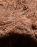 Close-up of undyed brown alpaca fleece from our own herd at Mulgoa, western Sydney, showing the crimp before it is washed or carded.