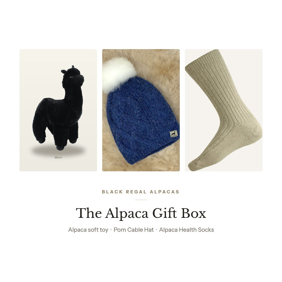 The Alpaca Gift Box: a black alpaca soft toy, a Pom Cable Hat and a pair of Alpaca Health Socks.